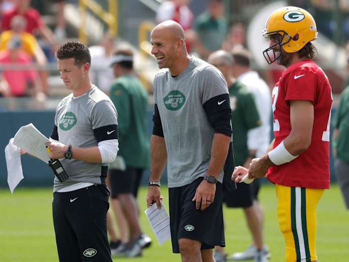 Robert Saleh and Aaron Rodgers at a joint training camp practice in 2021